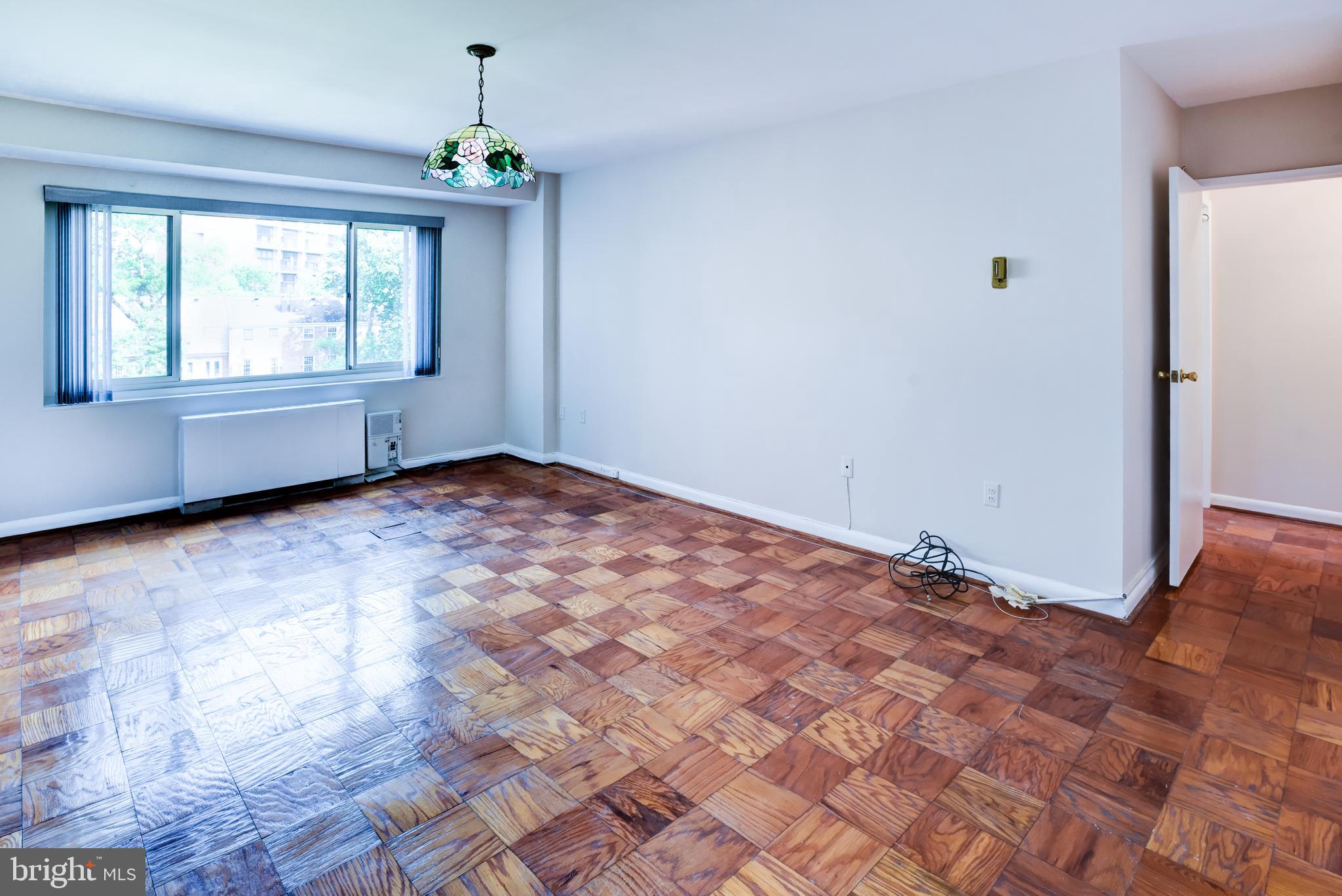 4201 Cathedral Avenue Northwest, Unit 1004E Washington, DC 20016 - Photo 35 of 69 a view of an empty room with a window