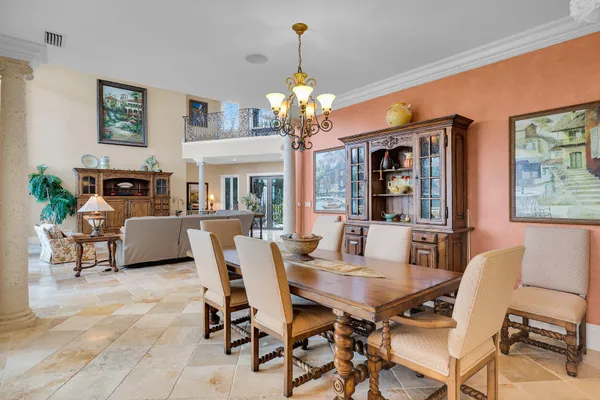 a kitchen with stainless steel appliances granite countertop a sink dishwasher and cabinets with wooden floor