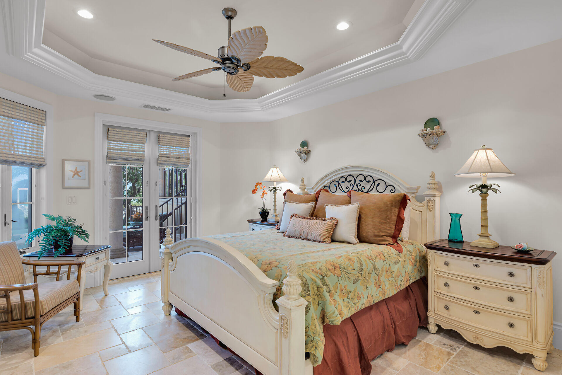 301 Ixora Street Marathon, FL 33050 - Photo 27 of 91 a bedroom with a bed and a chandelier