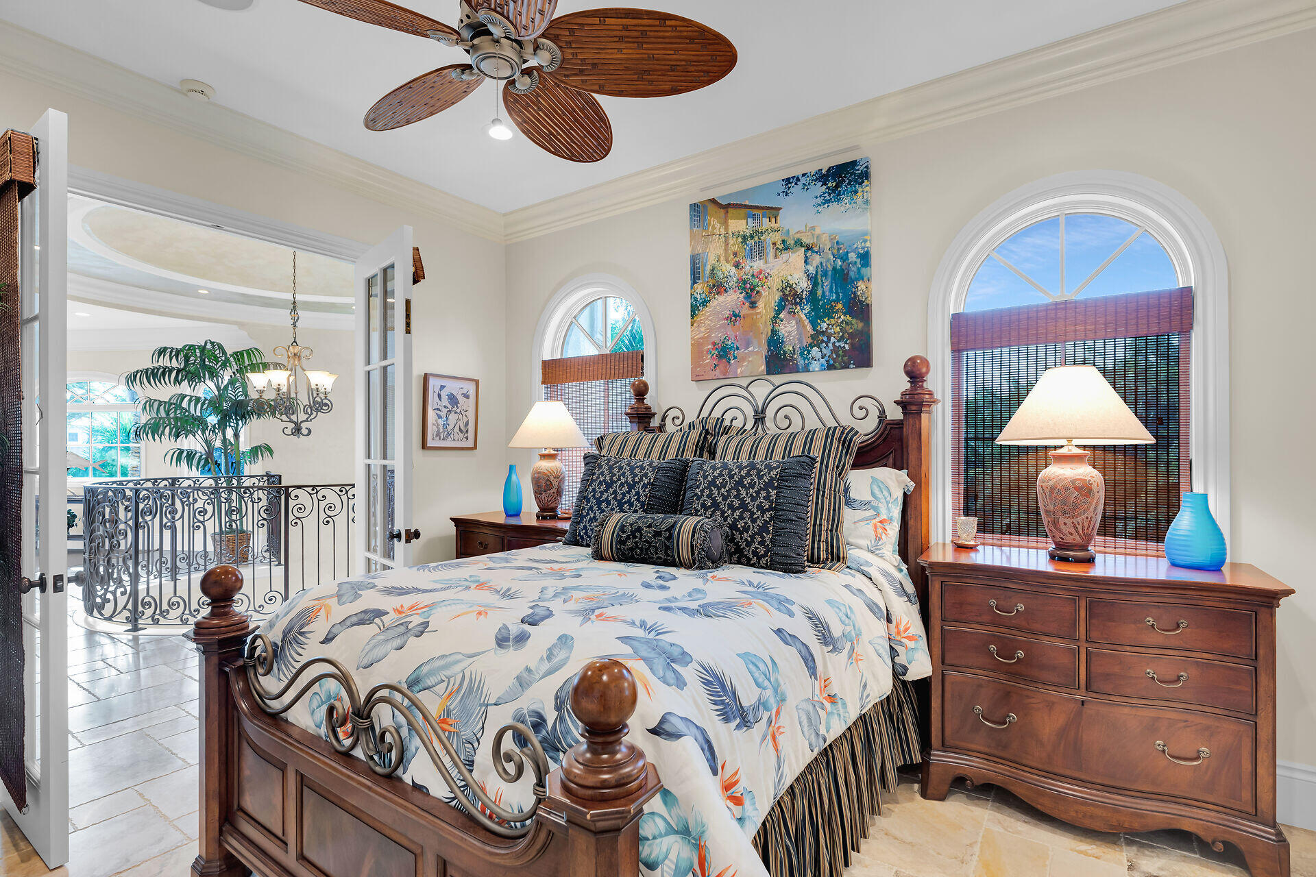 301 Ixora Street Marathon, FL 33050 - Photo 32 of 91 a bedroom with a bed and dresser with mirror