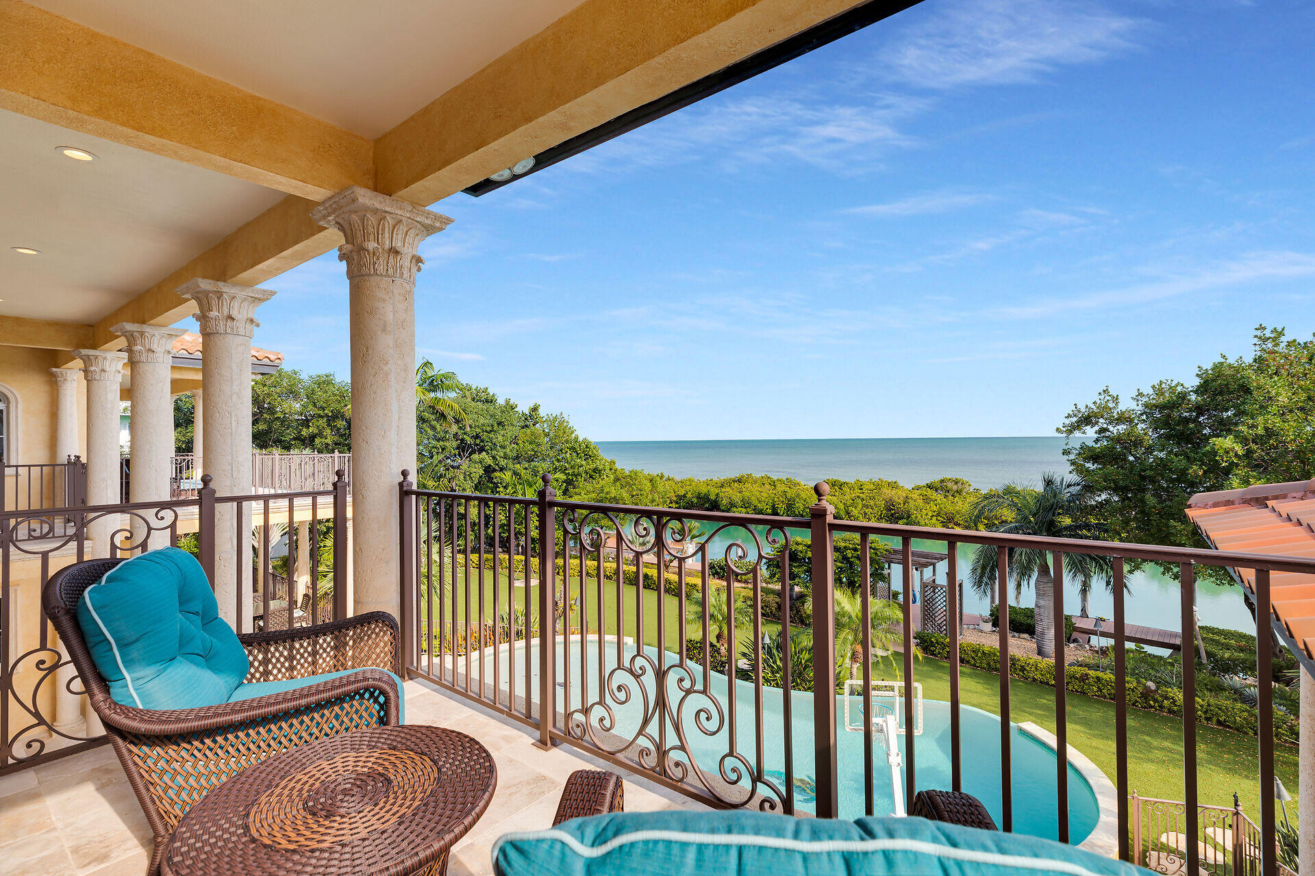301 Ixora Street Marathon, FL 33050 - Photo 58 of 91 a view of a chair and table in the balcony