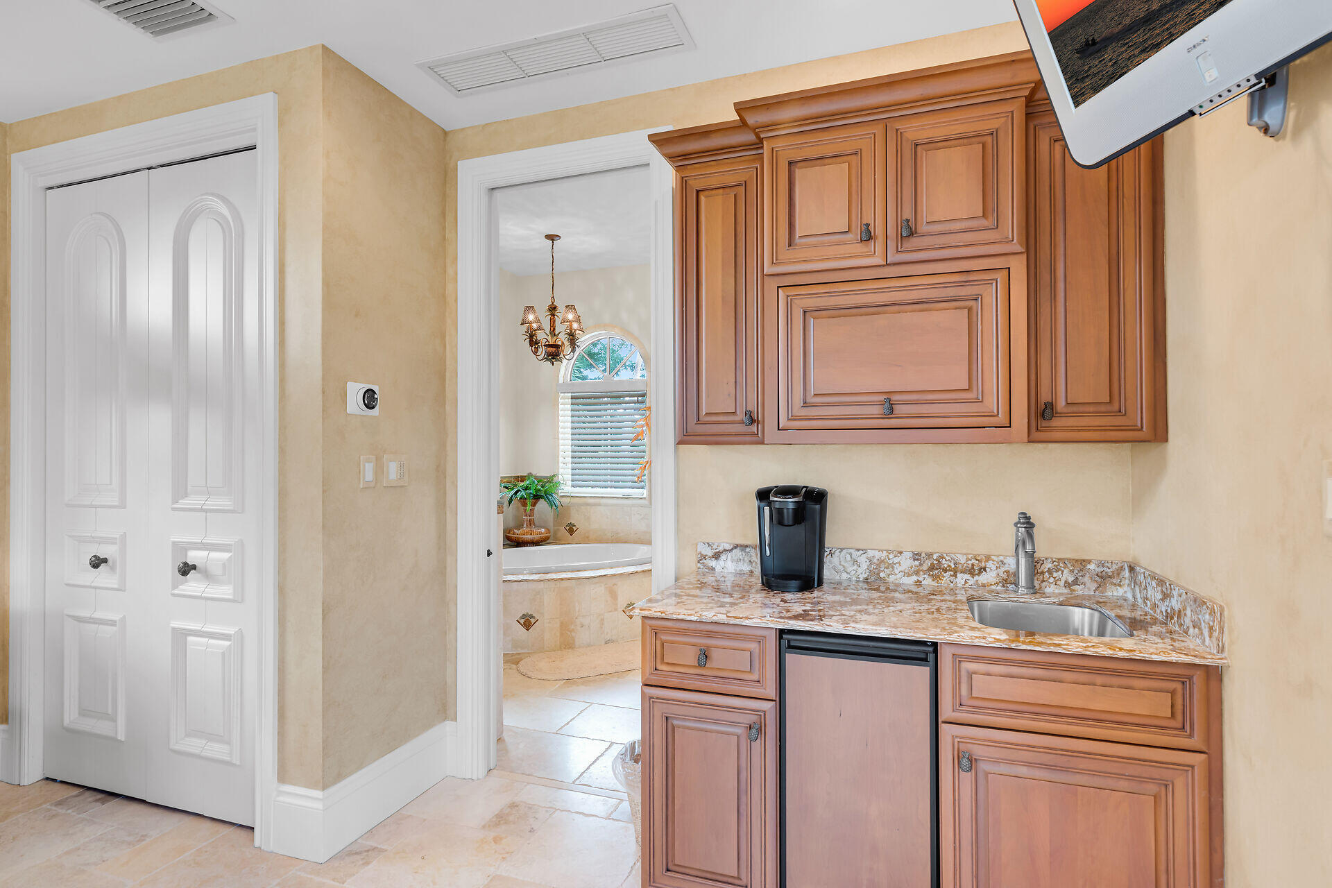 301 Ixora Street Marathon, FL 33050 - Photo 64 of 91 a kitchen with stainless steel appliances granite countertop a sink and cabinets