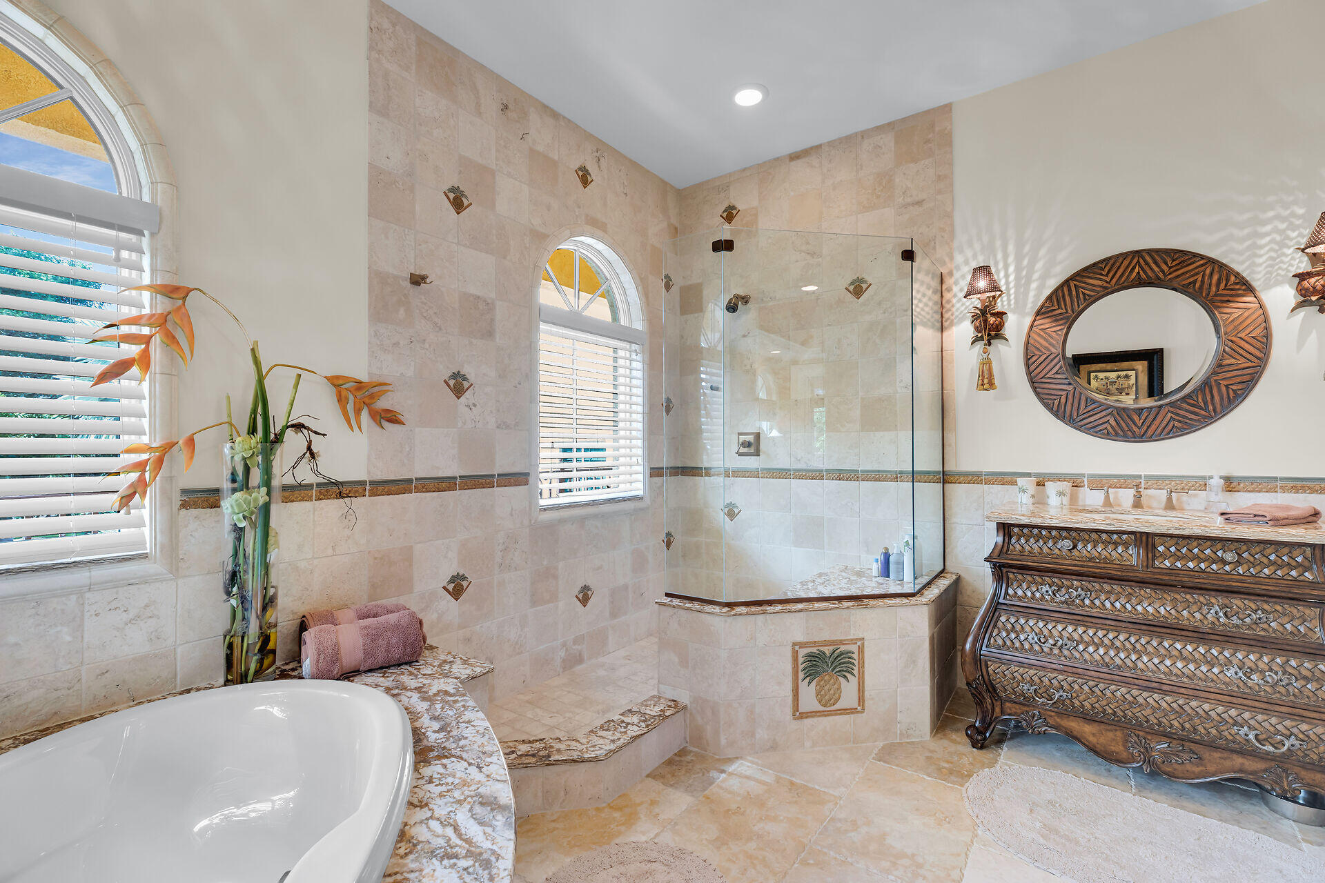 301 Ixora Street Marathon, FL 33050 - Photo 66 of 91 a bathroom with a tub sink and mirror