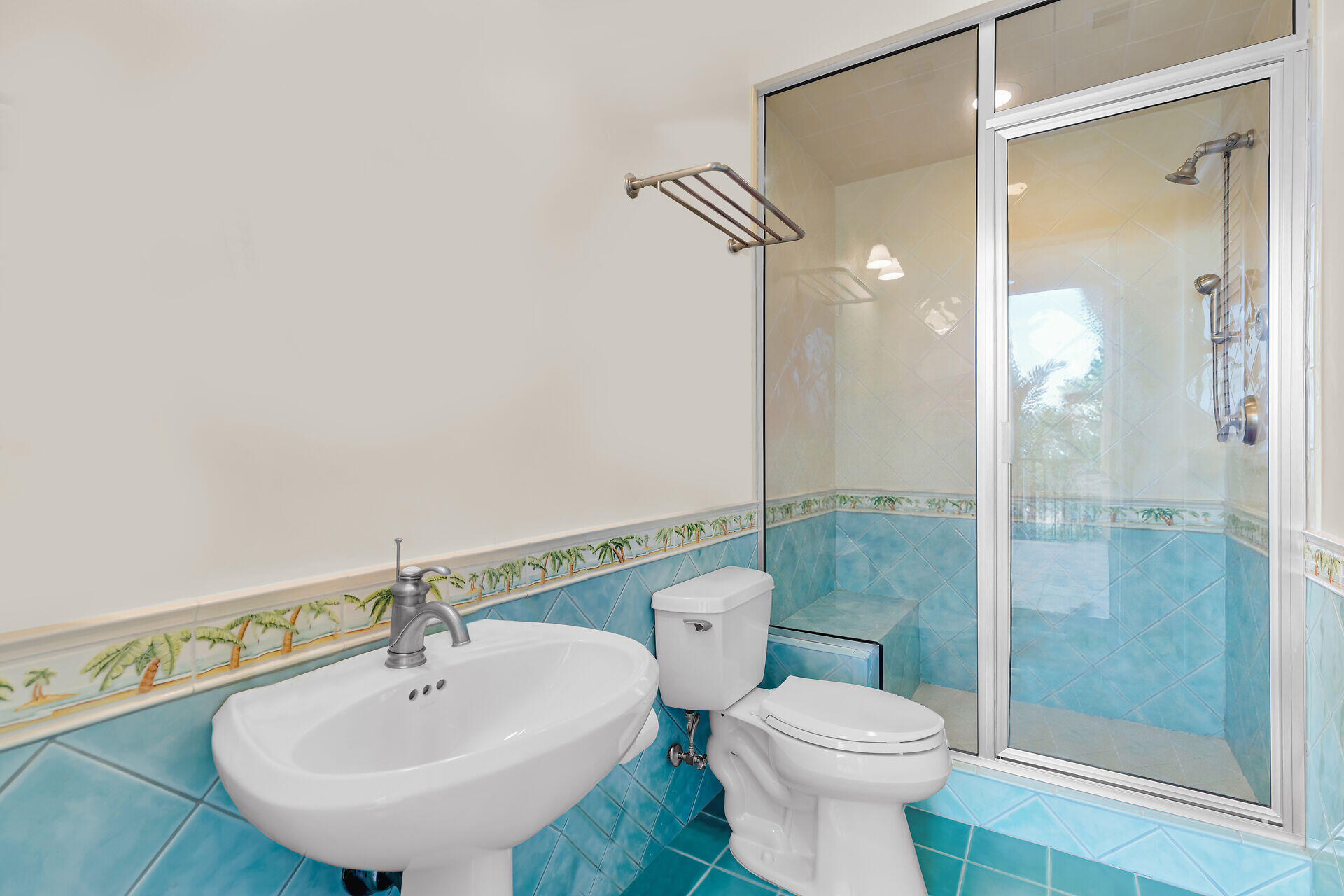 301 Ixora Street Marathon, FL 33050 - Photo 70 of 91 a bathroom with a sink toilet and shower