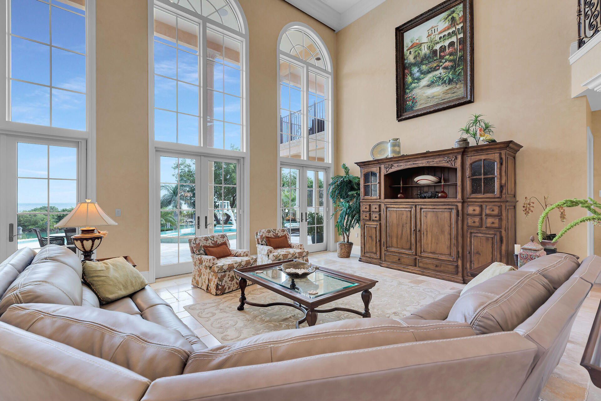 301 Ixora Street Marathon, FL 33050 - Photo 10 of 91 a living room with furniture a rug and a floor to ceiling window