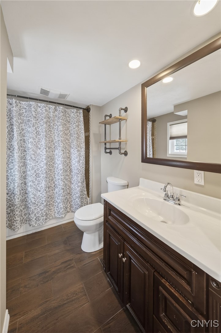 8403 Gaskin Road Clay, NY 13027 - Photo 26 of 49 First floor full bathroom