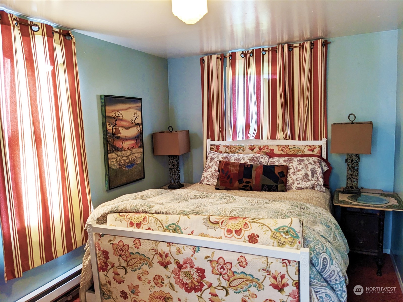 175 Dabob Post Office Road Quilcene, WA 98376 - Photo 24 of 40 a bedroom with a bed and a window