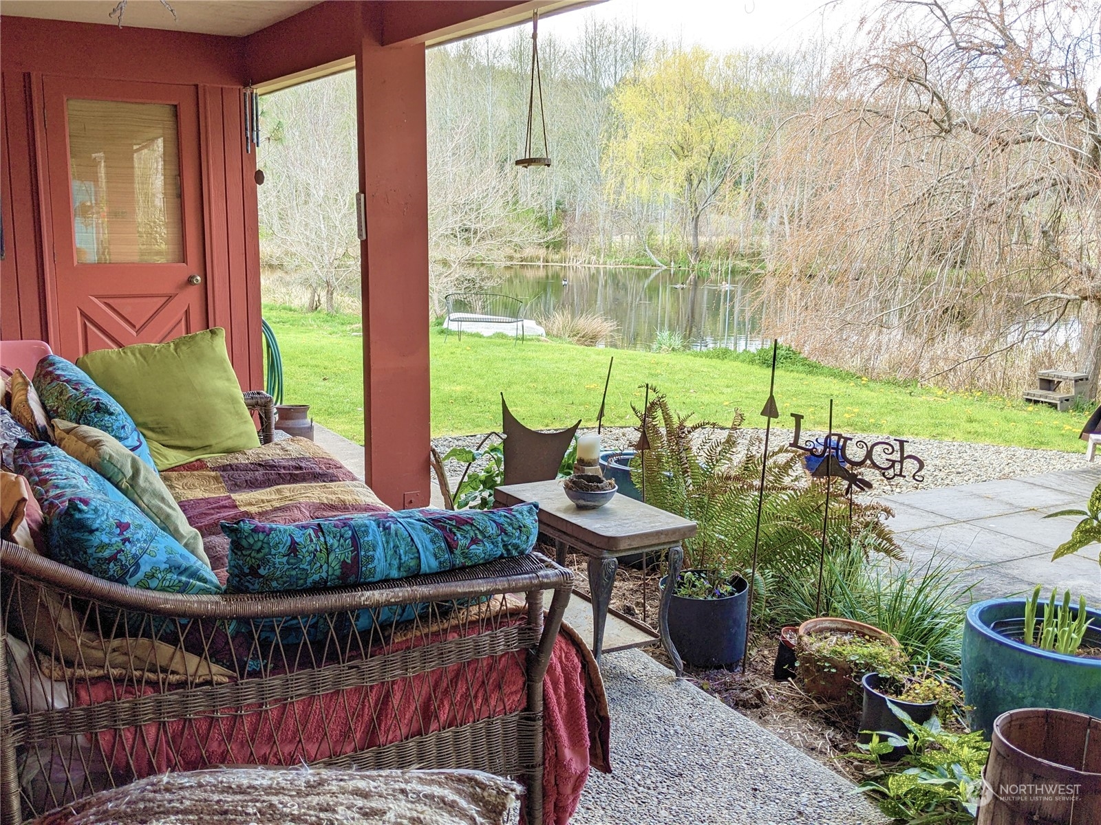 175 Dabob Post Office Road Quilcene, WA 98376 - Photo 5 of 40 a view of an outdoor sitting area with furniture and garden
