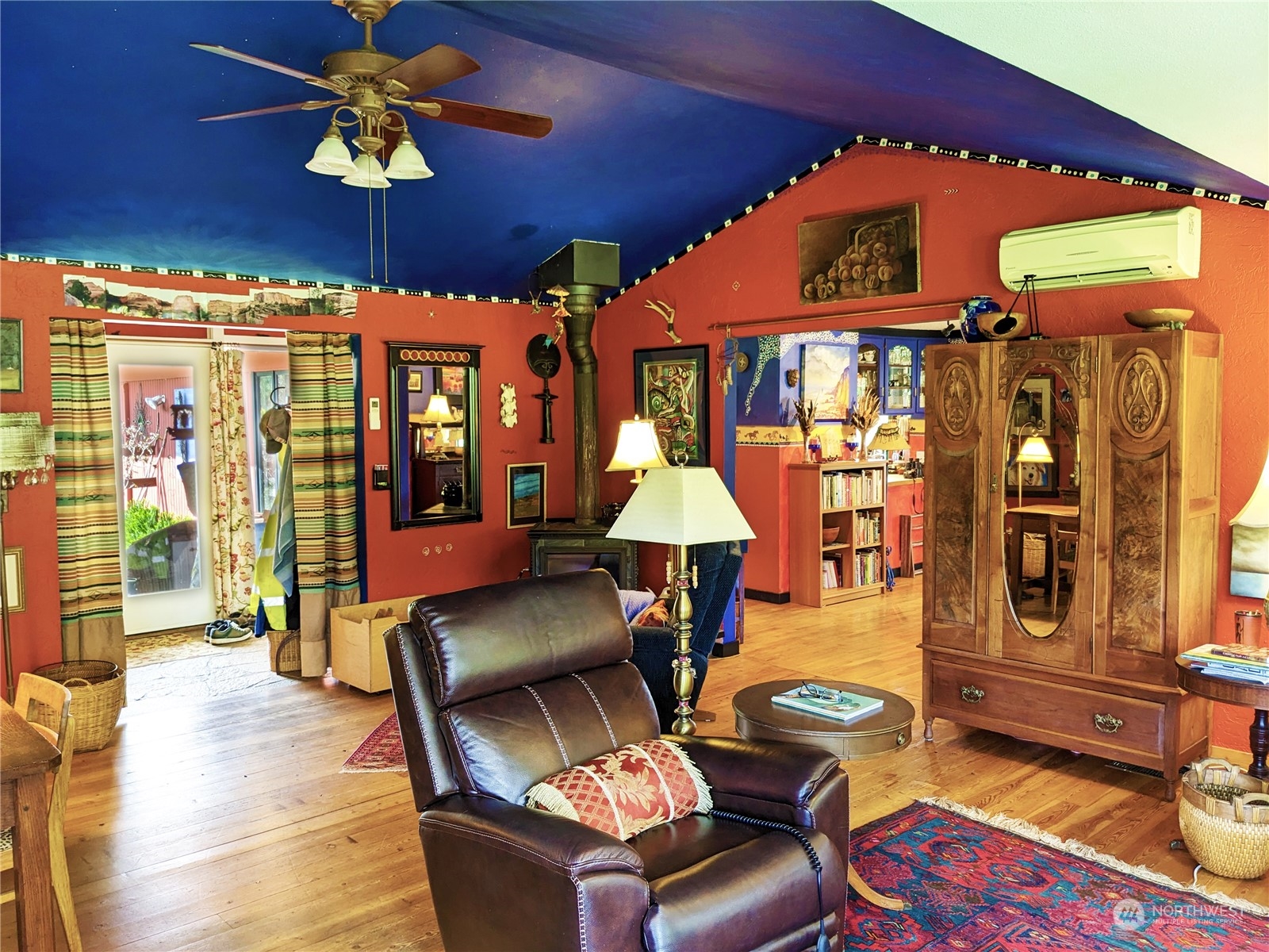 175 Dabob Post Office Road Quilcene, WA 98376 - Photo 7 of 40 a living room with patio furniture and a chandelier