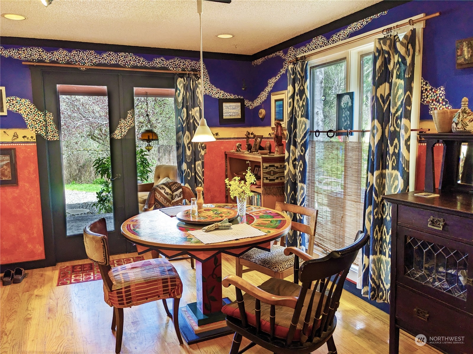 175 Dabob Post Office Road Quilcene, WA 98376 - Photo 8 of 40 a view of a dining room with furniture and a window
