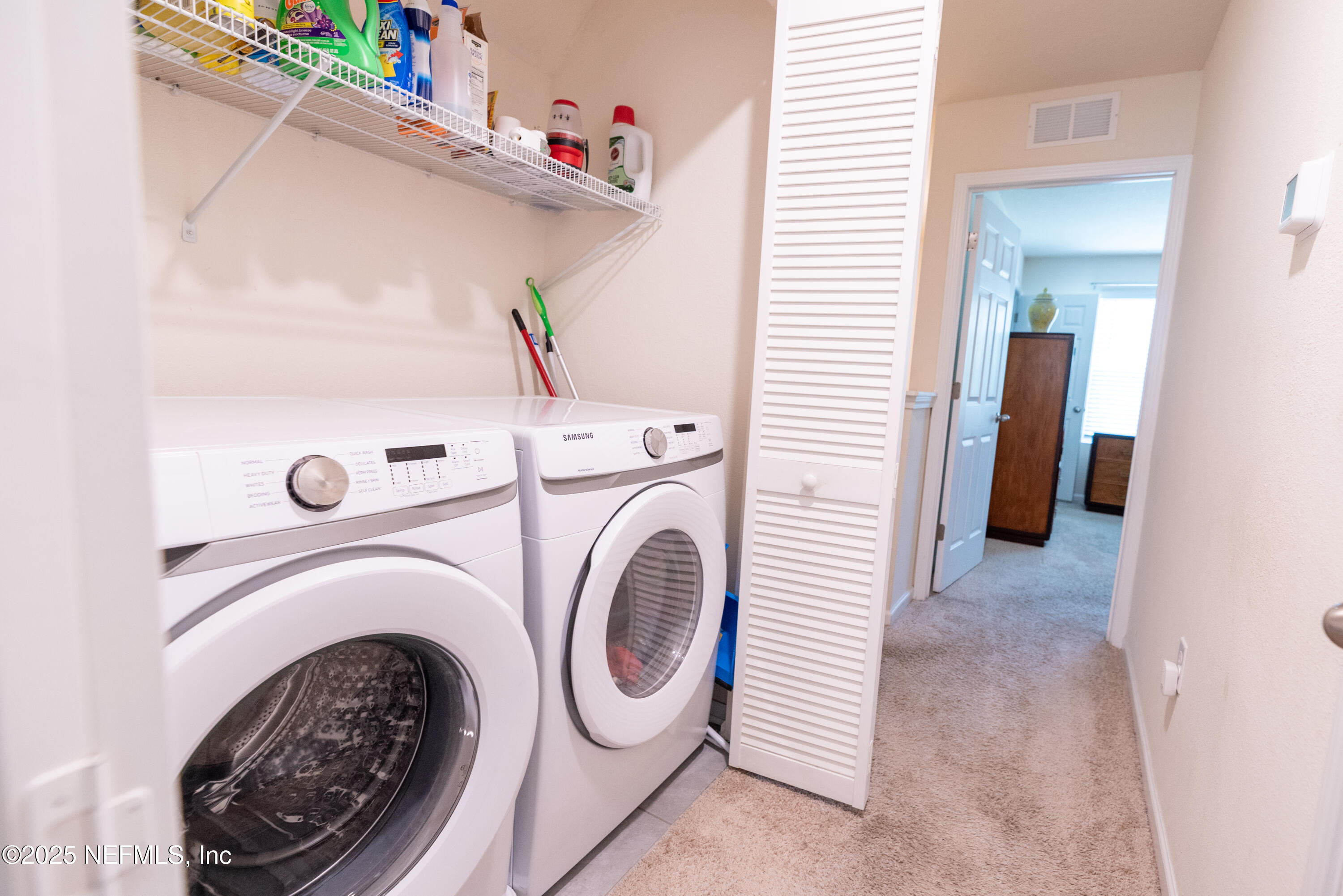 86990 Mainline Road Yulee, FL 32097 - Photo 12 of 17 a view of washer and dryer in a utility room