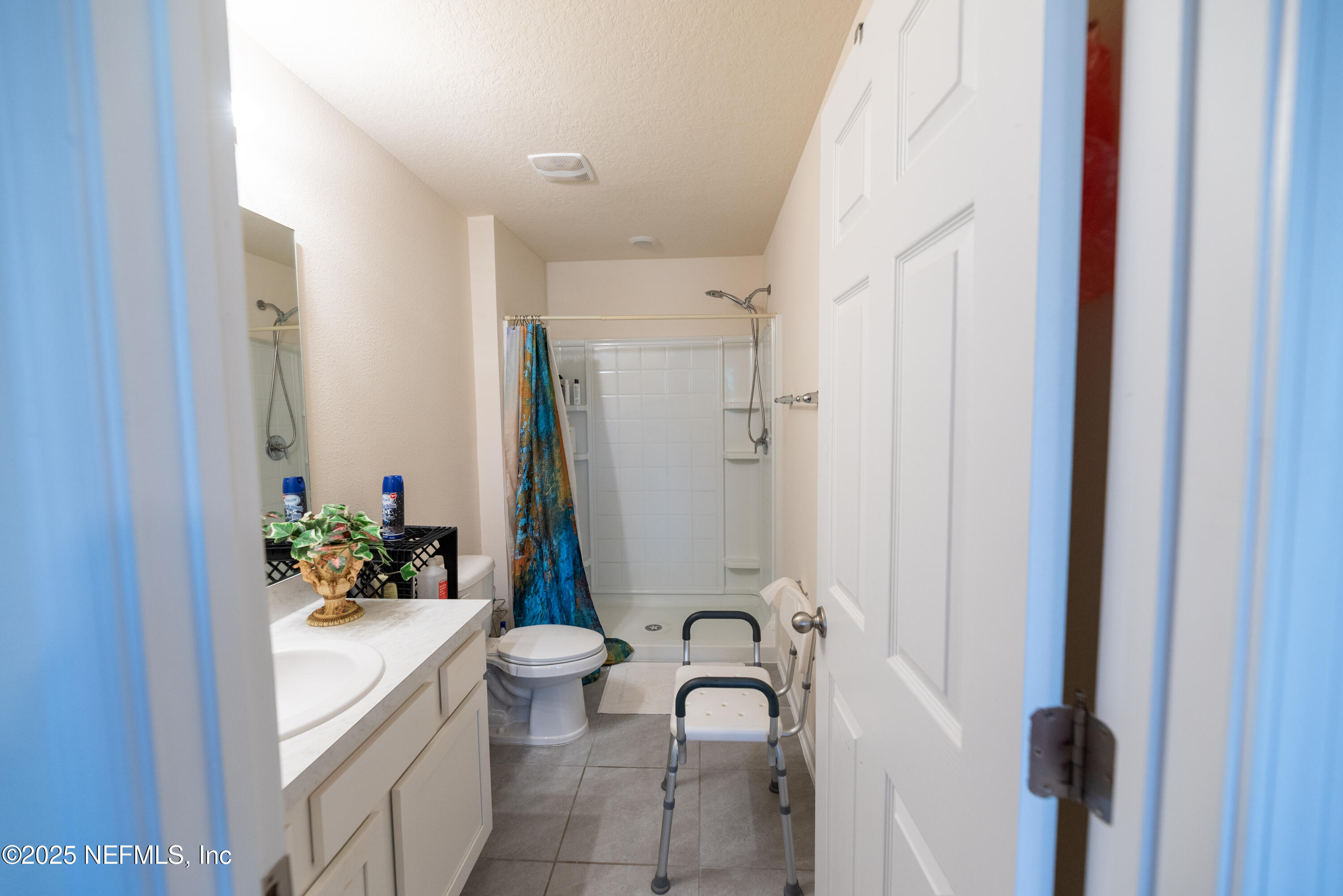 86990 Mainline Road Yulee, FL 32097 - Photo 15 of 17 a bathroom with a sink toilet and shower