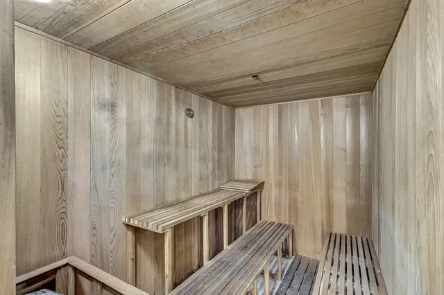 a view of a balcony with wooden floor