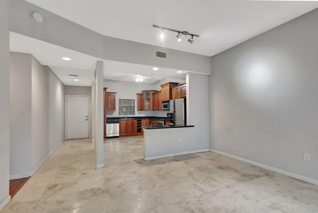 a view of a kitchen with a sink