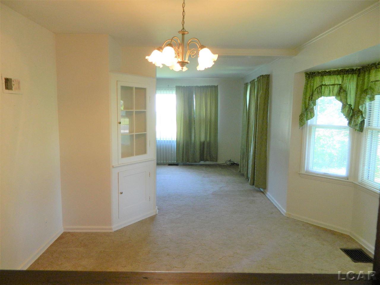 211 2nd Street Addison, MI 49220 - Photo 9 of 14 Dining Room to Living Roo