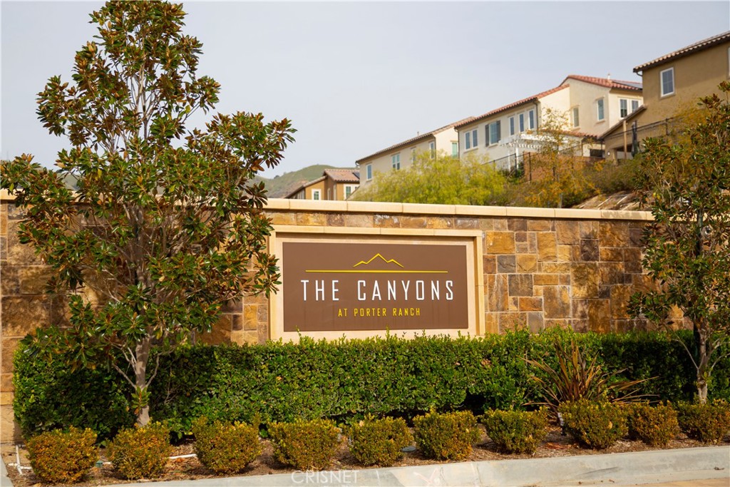 20800 Pine Cone Circle Porter Ranch, CA 91326 - Photo 33 of 43 a sign on the side of a building