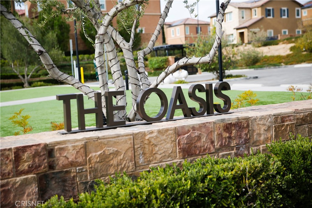 20800 Pine Cone Circle Porter Ranch, CA 91326 - Photo 34 of 43 a view of a street with a sign of a park