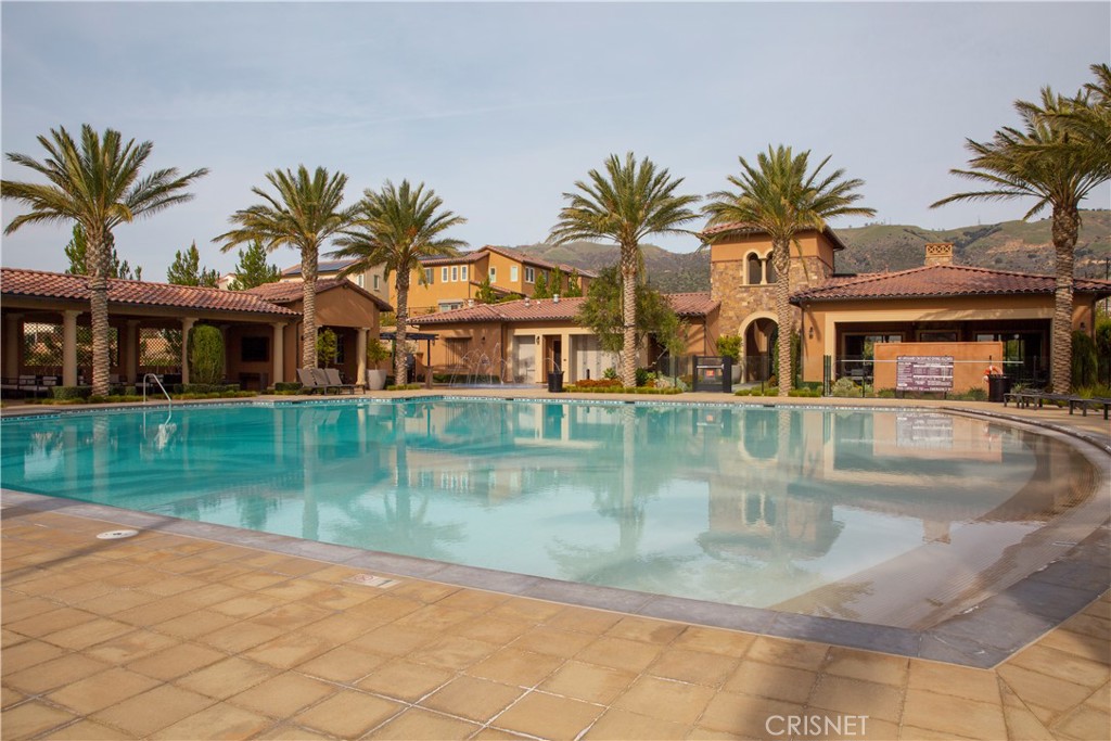 20800 Pine Cone Circle Porter Ranch, CA 91326 - Photo 36 of 43 a view of a house with pool and sitting area