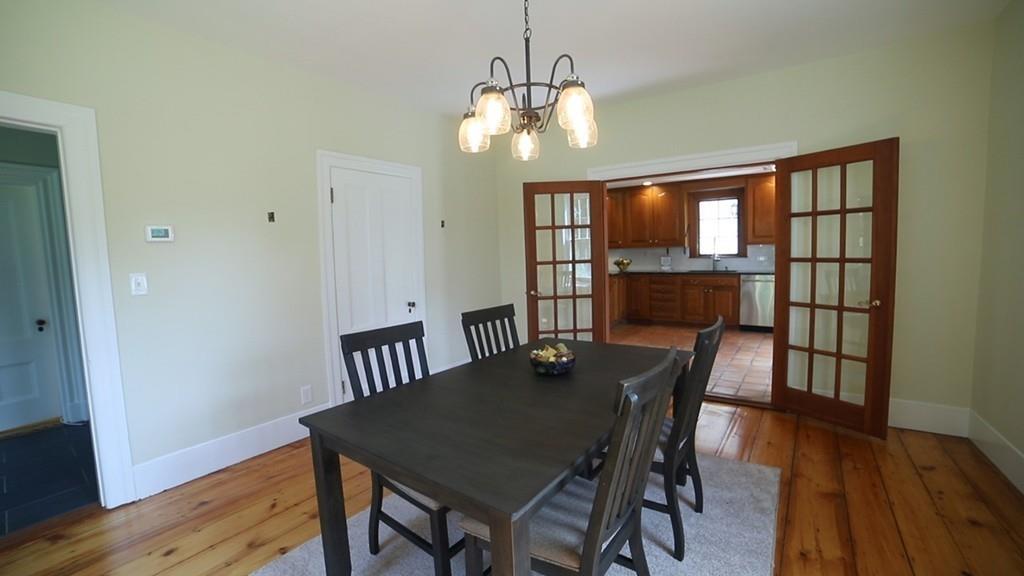 457 Edmands Road Framingham, MA 01701 - Photo 14 of 31 a view of a dining room with furniture window and wooden floor