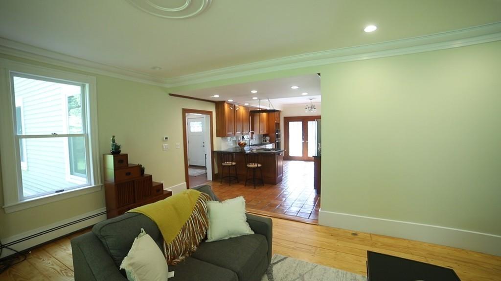 457 Edmands Road Framingham, MA 01701 - Photo 17 of 31 a living room with furniture and a wooden floor