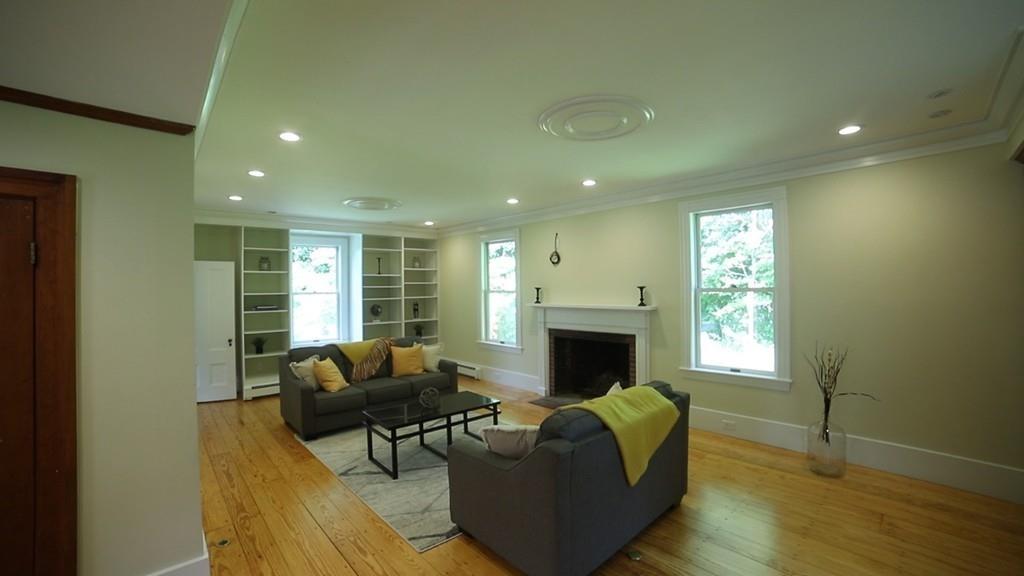 457 Edmands Road Framingham, MA 01701 - Photo 18 of 31 a living room with furniture fireplace and window