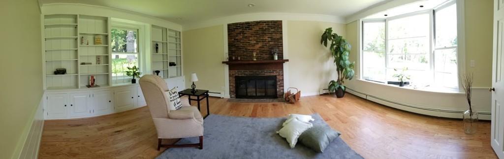 457 Edmands Road Framingham, MA 01701 - Photo 19 of 31 a living room with furniture and a fireplace