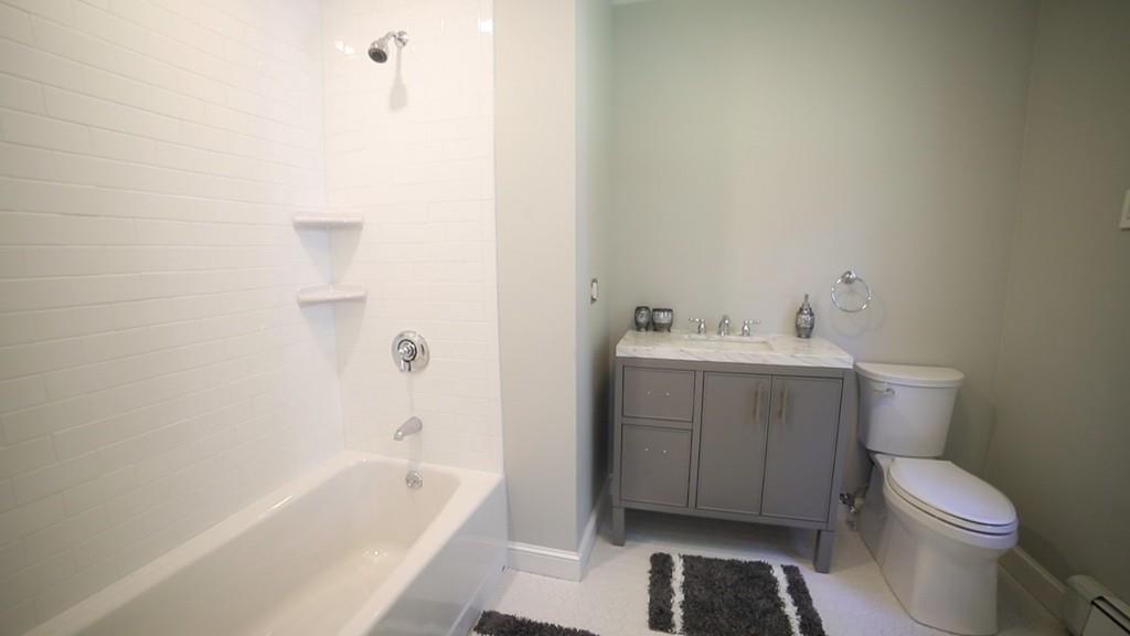 457 Edmands Road Framingham, MA 01701 - Photo 26 of 31 a bathroom with a sink toilet and bathtub
