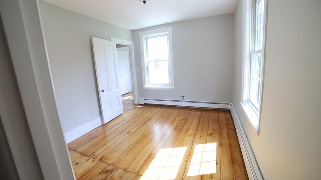 457 Edmands Road Framingham, MA 01701 - Photo 31 of 31 wooden floor in a room next to a window