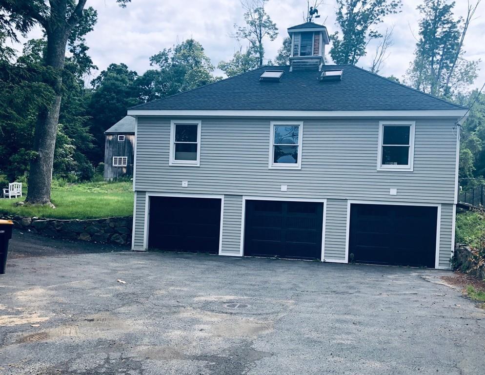 457 Edmands Road Framingham, MA 01701 - Photo 7 of 31 a front view of a house with a yard
