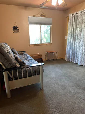 a view of furniture and window in a room