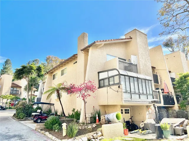 a front view of a building with balcony