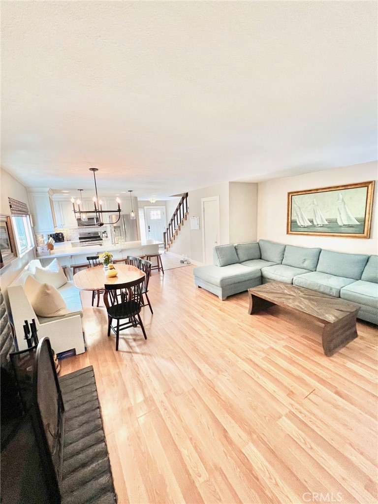 82 Canyon Terrace Road Avalon, CA 90704 - Photo 19 of 23 a living room with furniture and a wooden floor