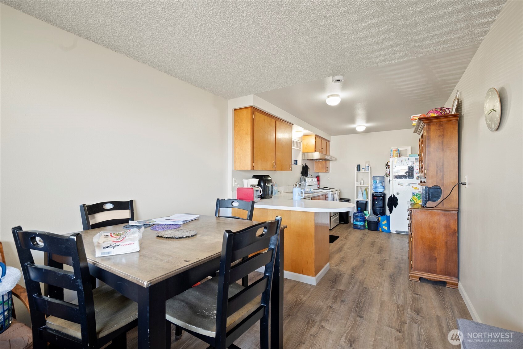 3610 Oakes Avenue Everett, WA 98201 - Photo 25 of 37 a view of a dining room with furniture and wooden floor