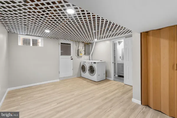 a utility room with dryer and washer