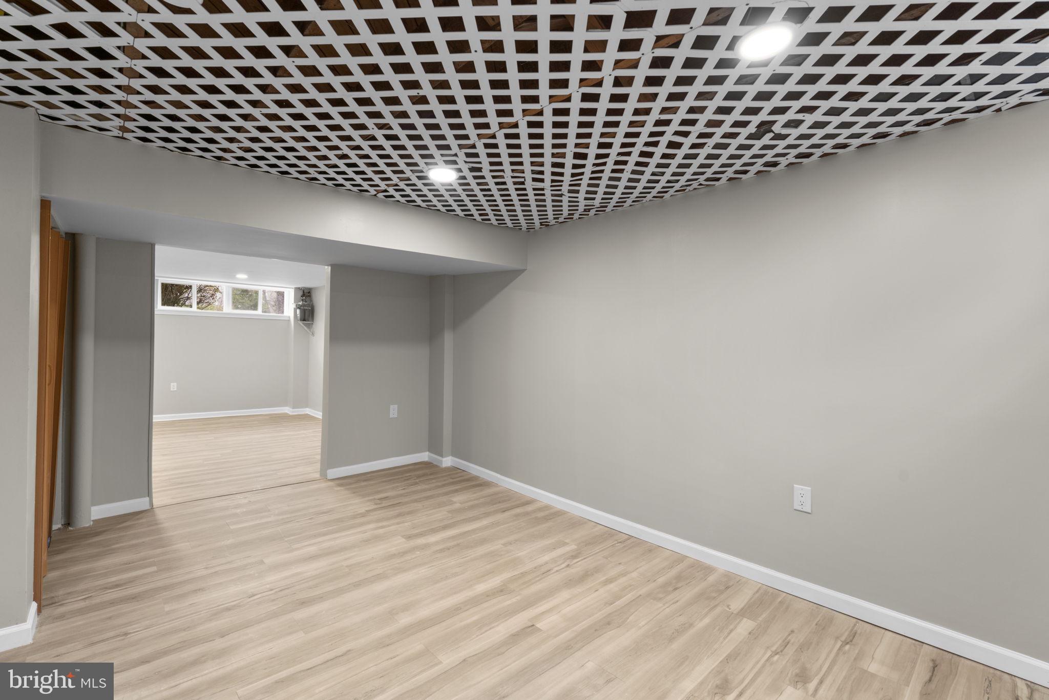 1607 Stonewood Road Baltimore, MD 21239 - Photo 37 of 53 a view of a black gate