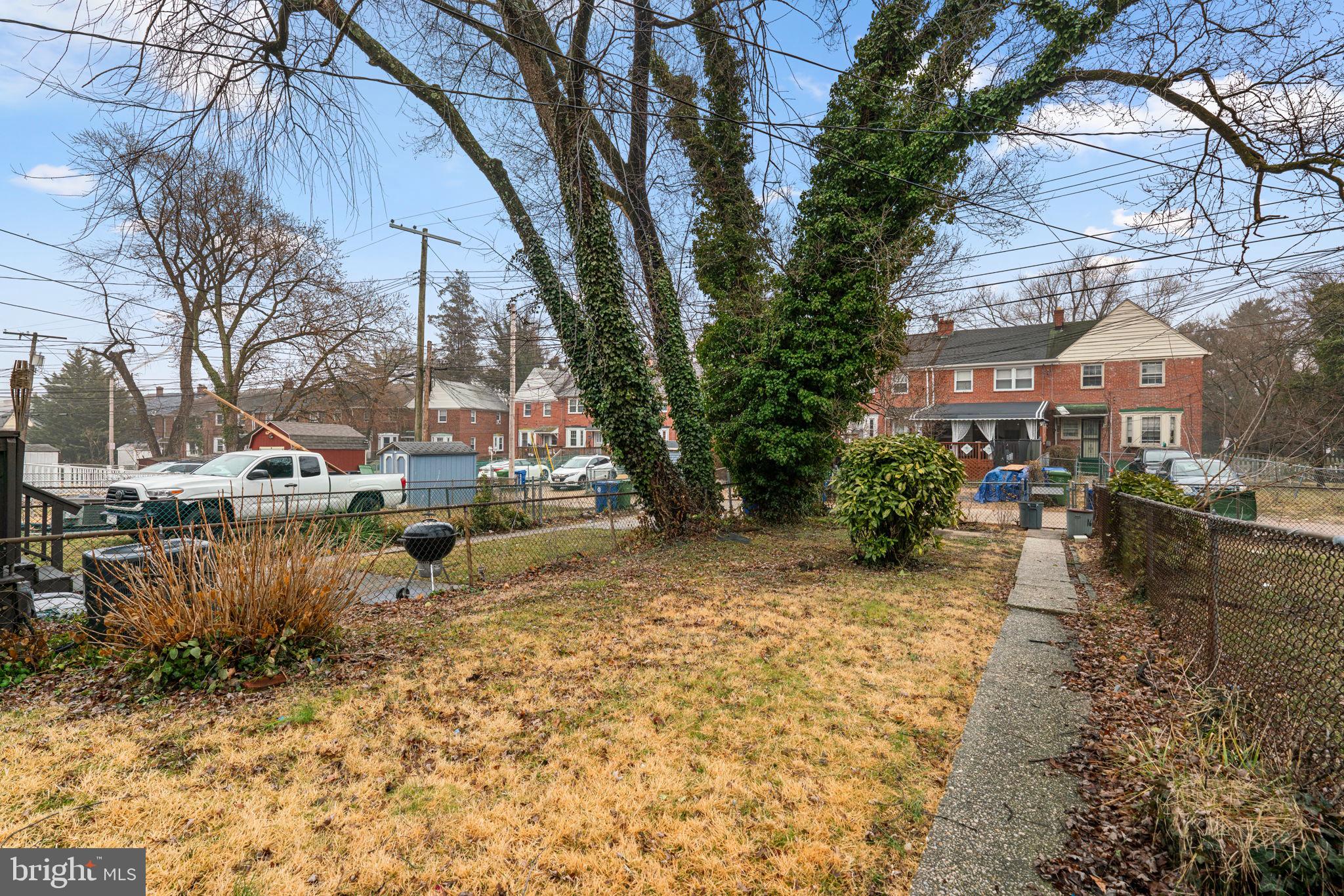 1607 Stonewood Road Baltimore, MD 21239 - Photo 42 of 53 a view of a lake with houses