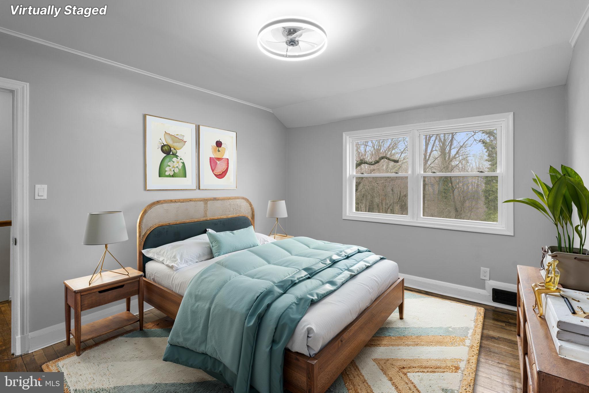 1607 Stonewood Road Baltimore, MD 21239 - Photo 46 of 53 a bedroom with bed and a window