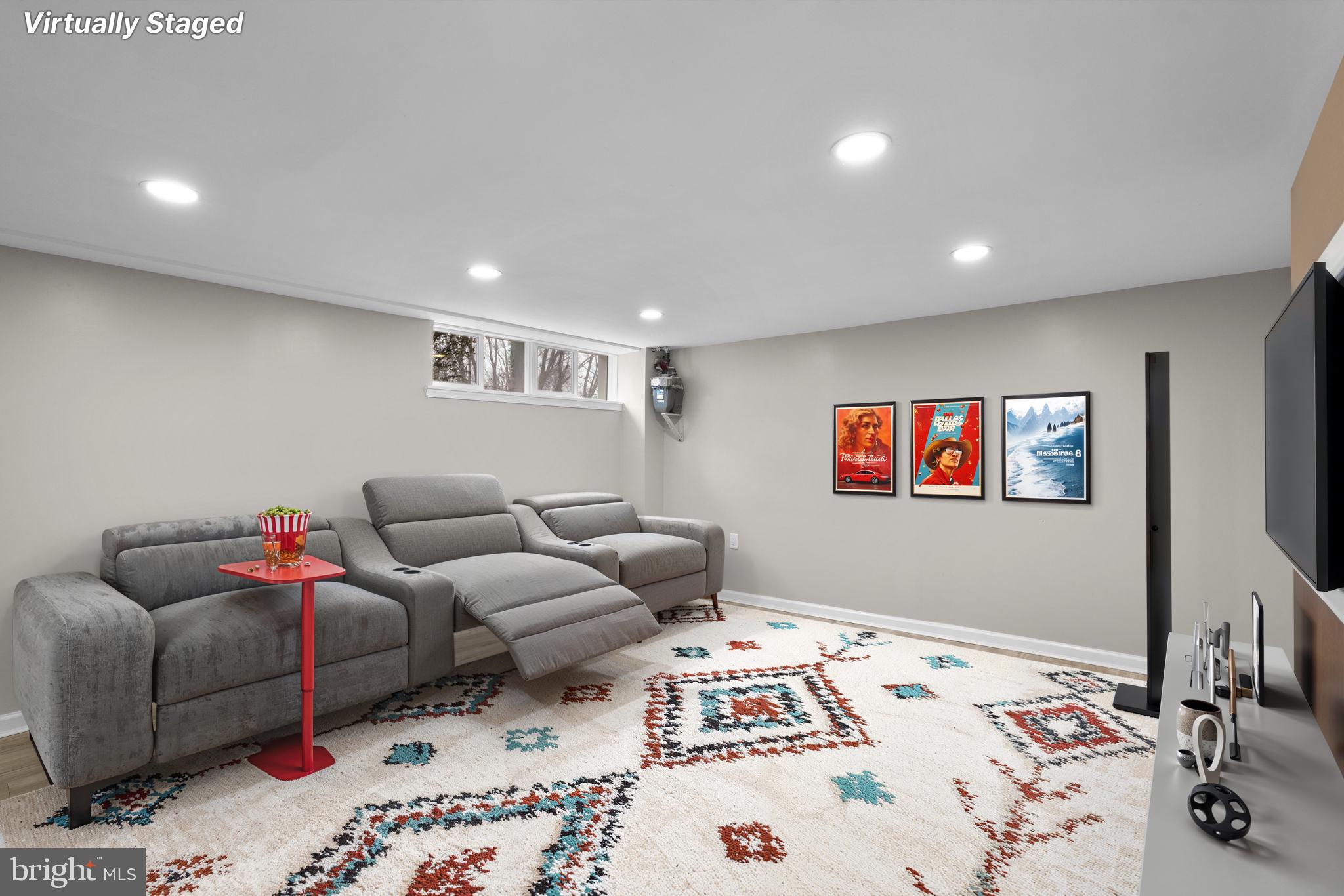 1607 Stonewood Road Baltimore, MD 21239 - Photo 48 of 53 a living room with furniture and a flat screen tv