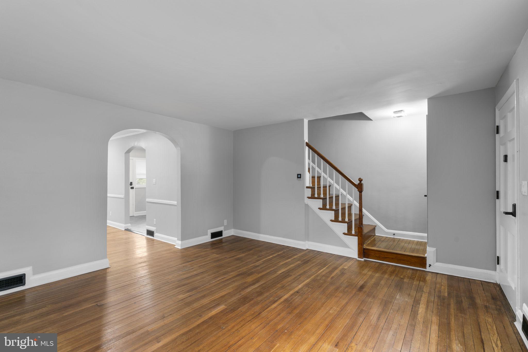 1607 Stonewood Road Baltimore, MD 21239 - Photo 6 of 53 a view of an entryway with wooden floor