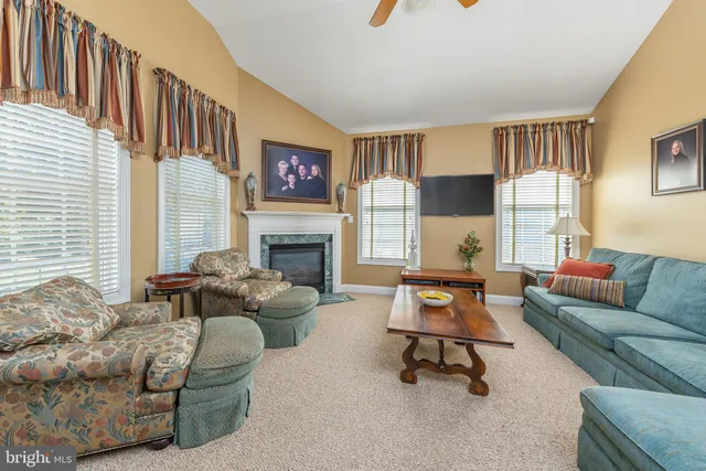 a bed room with a bed and a window