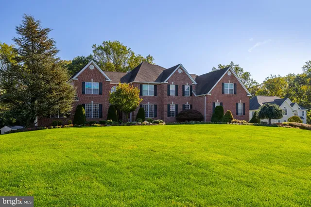 swimming pool view with a seating space