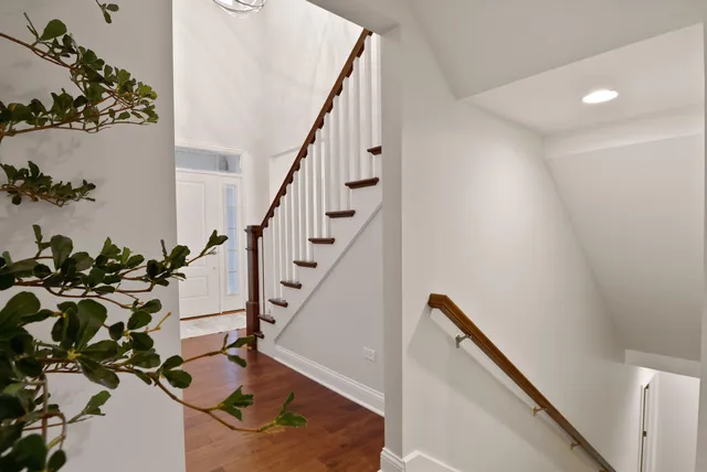 a view of entryway with wooden floor