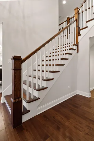 a view of entryway with wooden floor