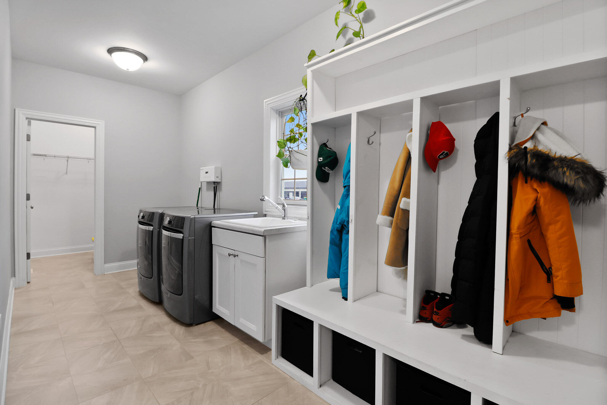 10230 Barbara Lane Munster, IN 46321 - Photo 21 of 47 a view of walk in closet with clothes and shoes