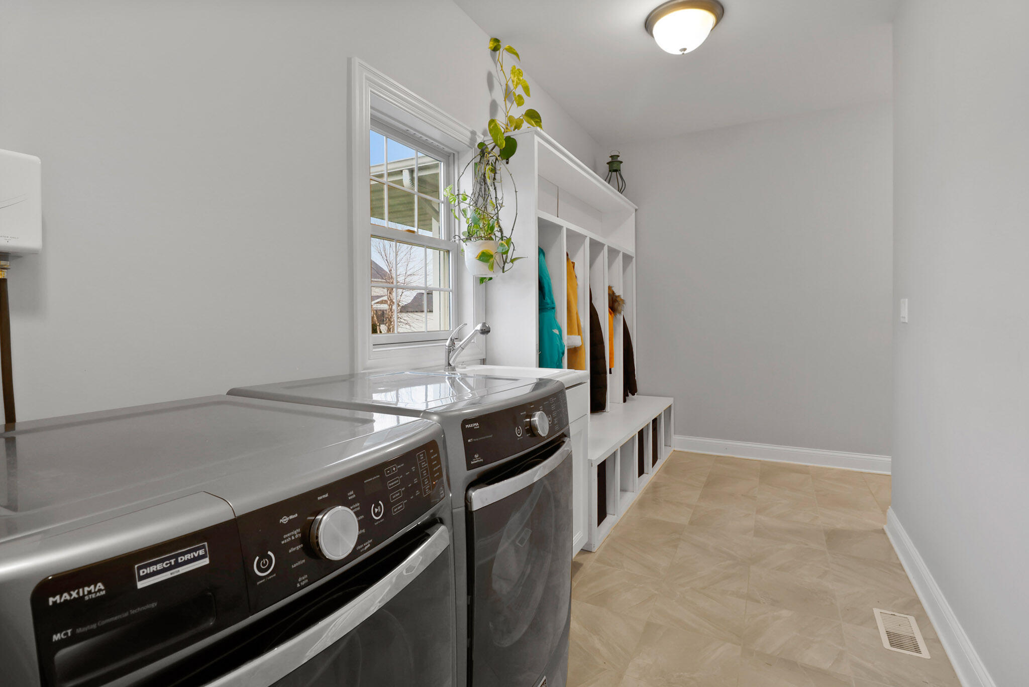 10230 Barbara Lane Munster, IN 46321 - Photo 22 of 47 a kitchen with a stove and a sink