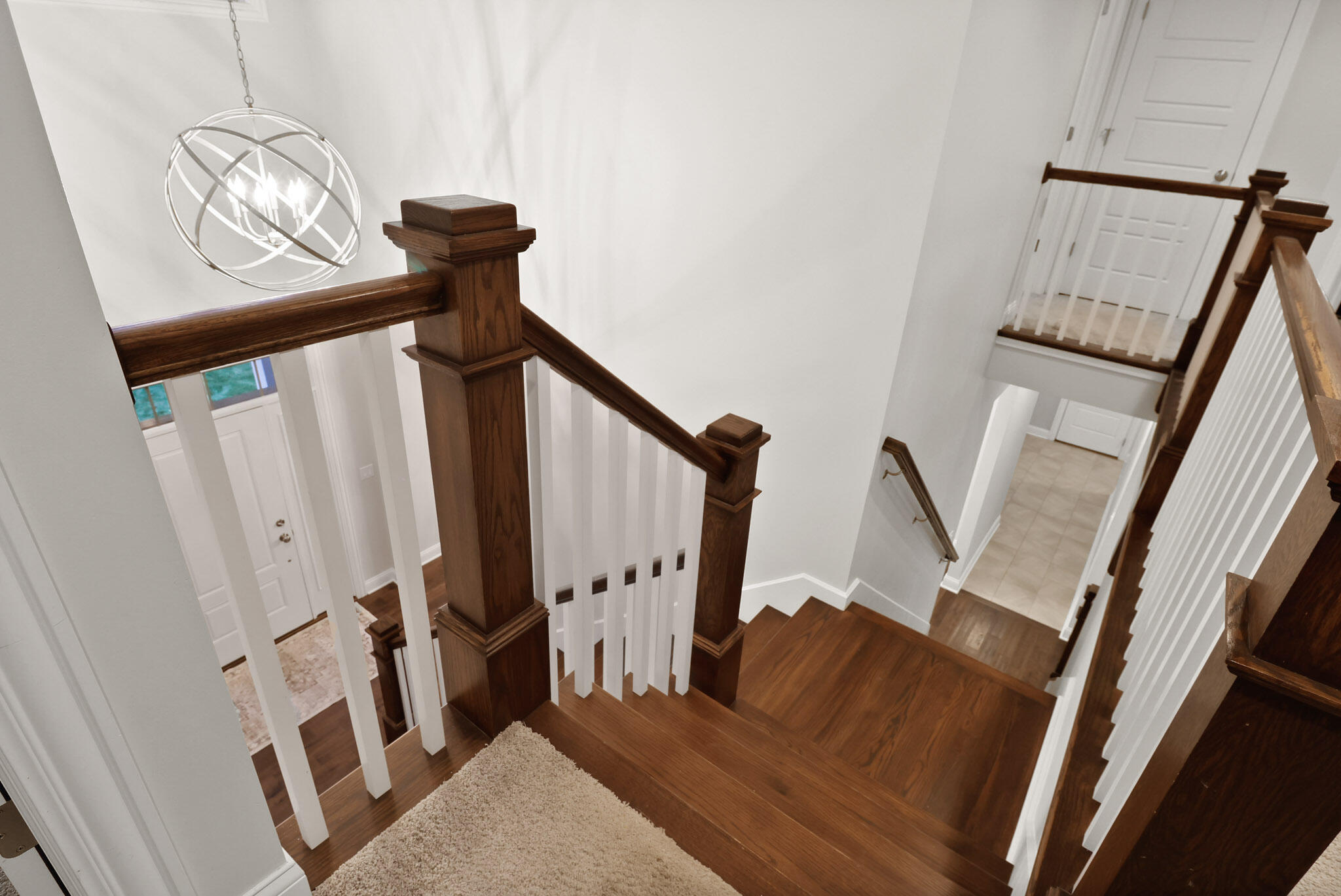 10230 Barbara Lane Munster, IN 46321 - Photo 24 of 47 a view of an entryway with wooden floor and staircase