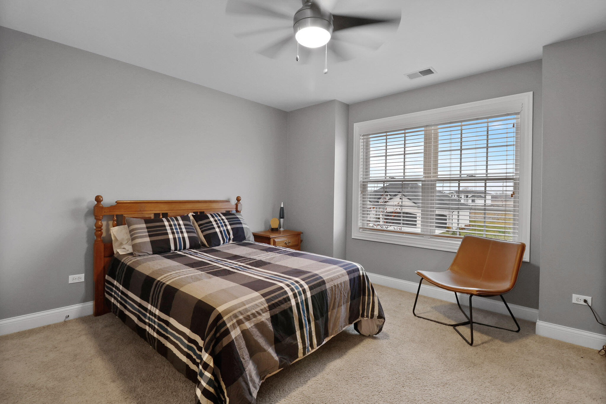 10230 Barbara Lane Munster, IN 46321 - Photo 25 of 47 a bedroom with a bed chair and a window