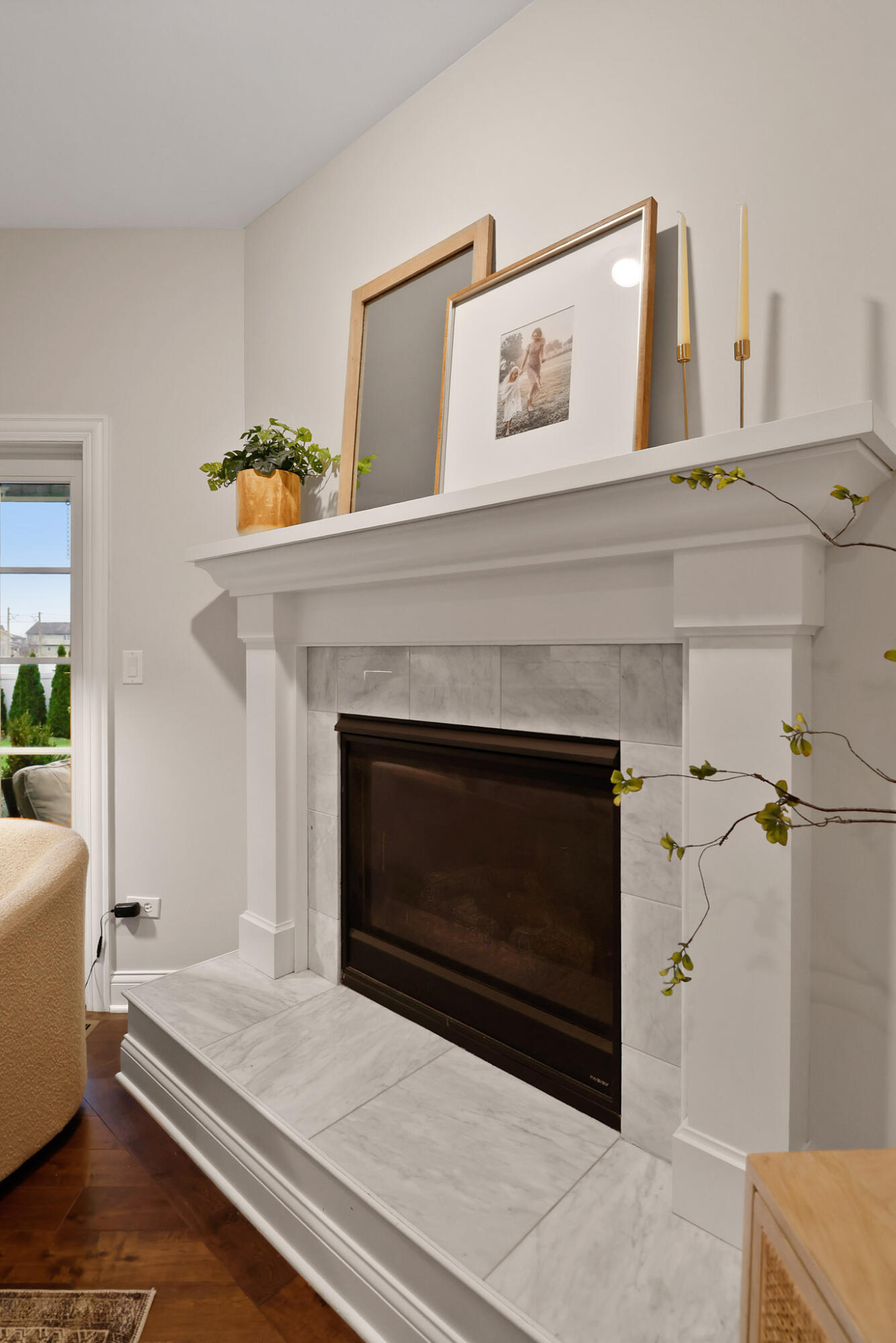 10230 Barbara Lane Munster, IN 46321 - Photo 8 of 47 a living room with furniture and a fireplace