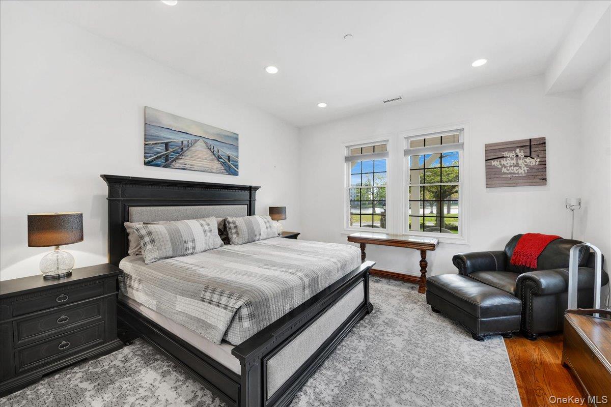 2 Harbor Lane, Unit 102 New Rochelle, NY 10805 - Photo 12 of 30 This bright room features white walls, recessed lighting, and two windows providing natural light