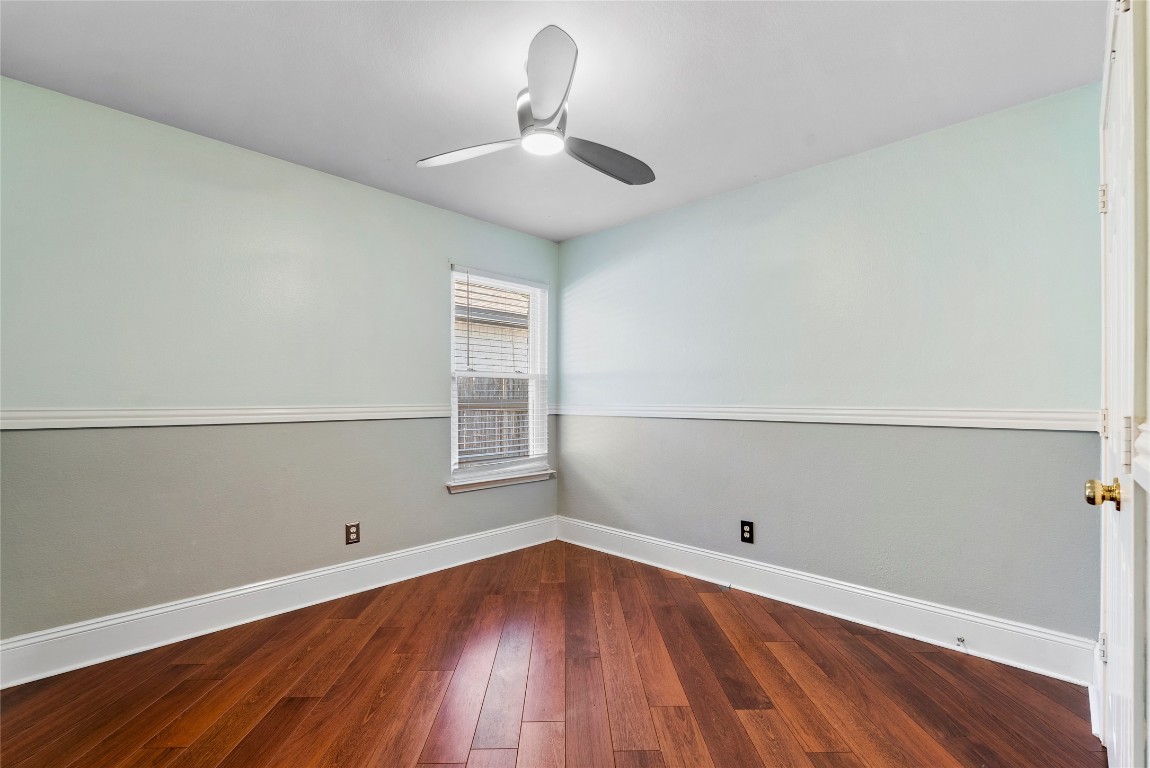 212 Valley Run Trail Elgin, TX 78621 - Photo 15 of 31 wooden floor in an empty room with a window